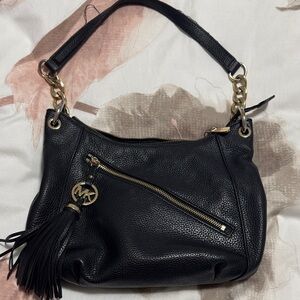 Michael Kors Black Shoulder Bag with Gold Accents - well used